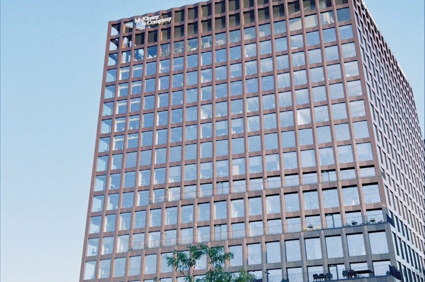 a large office building with a large glass front